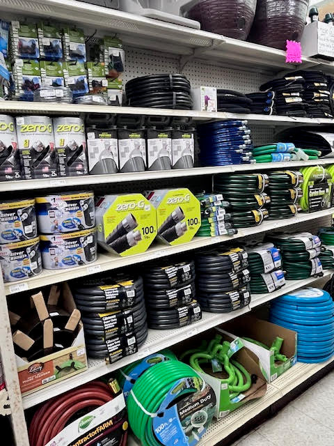 Wide selection of lawn and garden supplies at Chick's Southold Agway, including fertilizers, soil, and gardening tools.