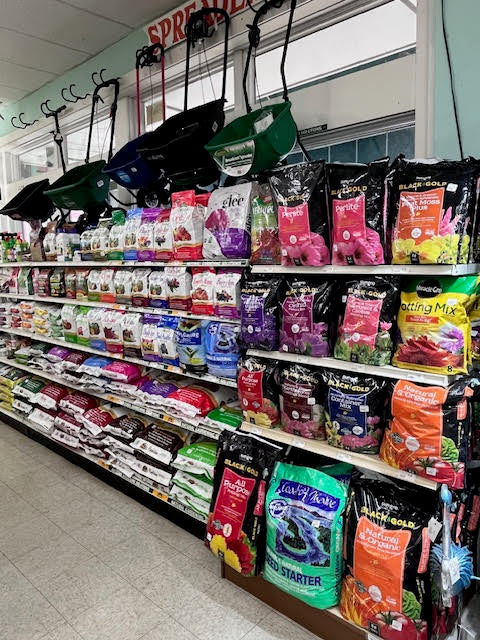 Wide selection of lawn and garden supplies at Chick's Southold Agway, including fertilizers, soil, and gardening tools.