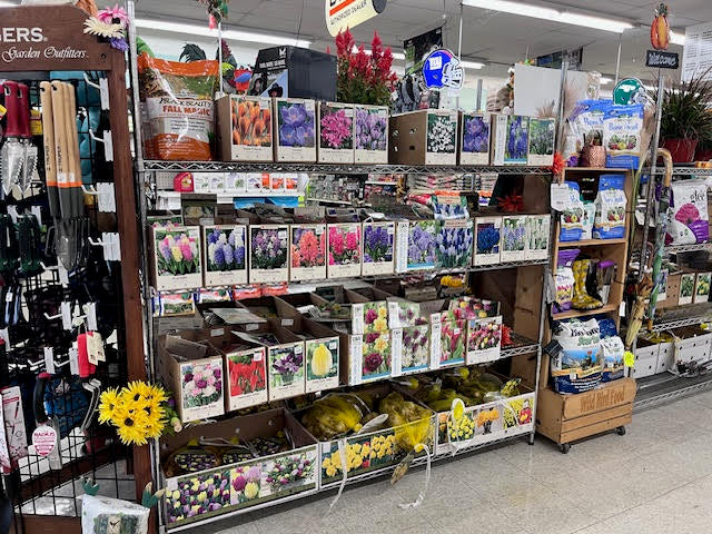 Wide selection of lawn and garden supplies at Chick's Southold Agway, including fertilizers, soil, and gardening tools.