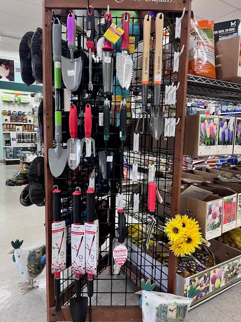 Wide selection of lawn and garden supplies at Chick's Southold Agway, including fertilizers, soil, and gardening tools.