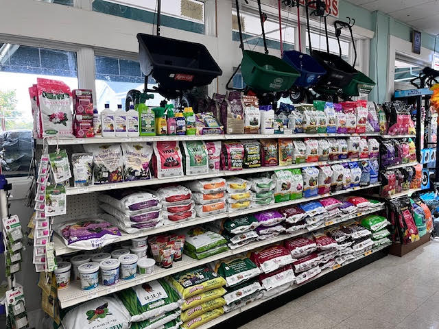 Wide selection of lawn and garden supplies at Chick's Southold Agway, including fertilizers, soil, and gardening tools.